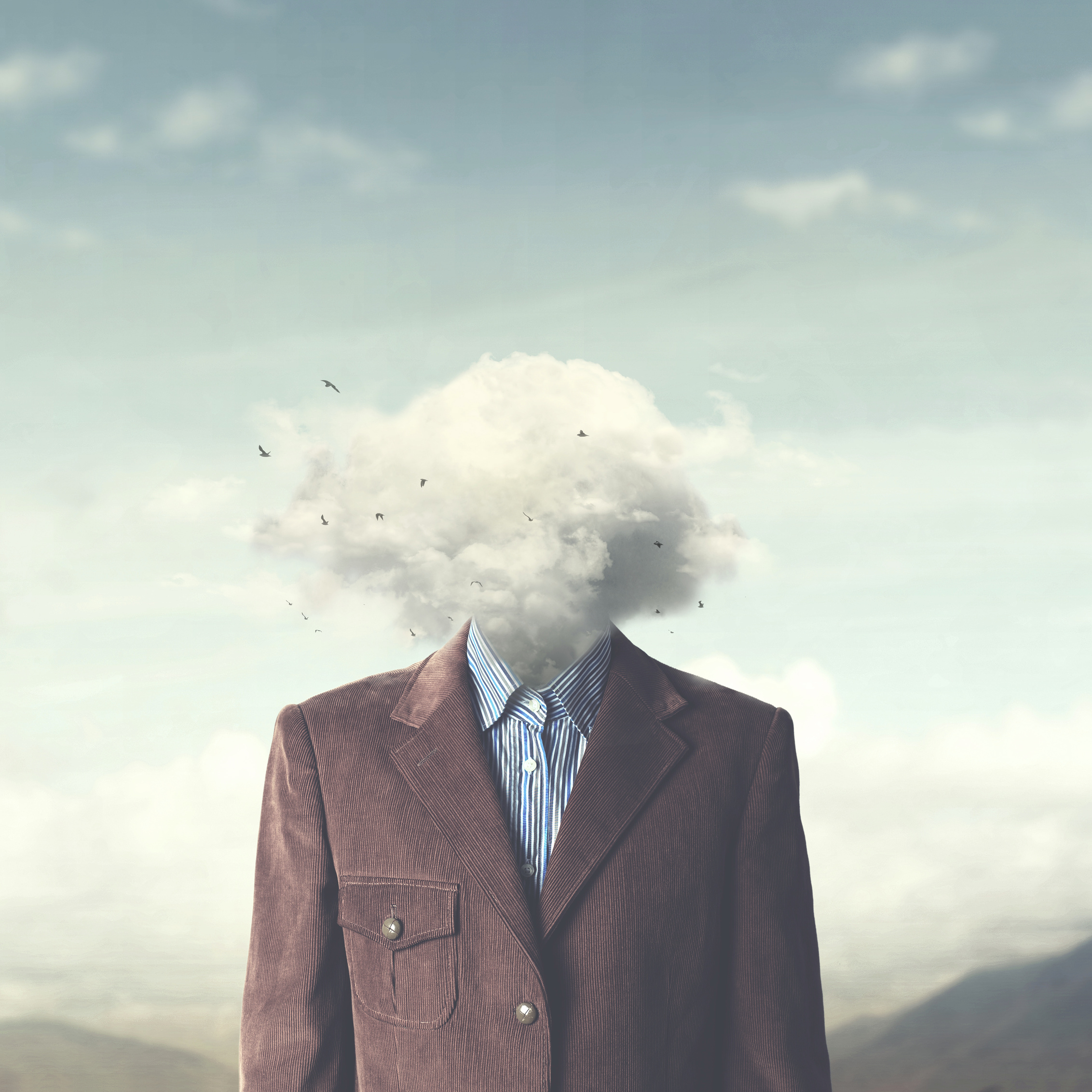 stressed man head in the cloud